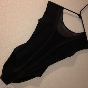 Very sexy black body suit with mesh strip